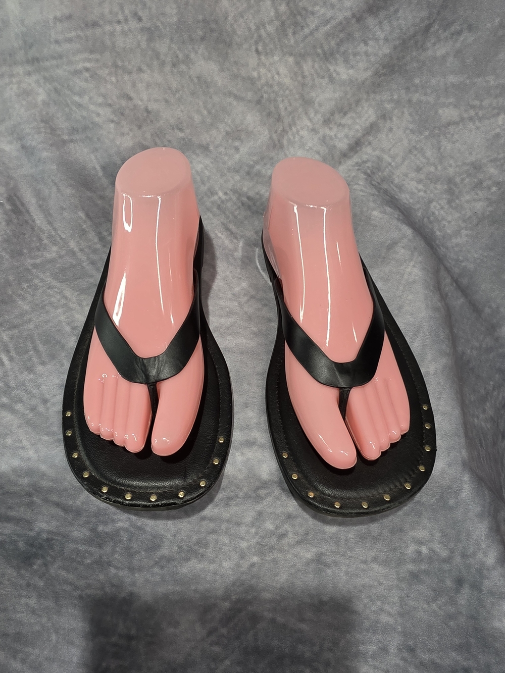 Free People Sona Thong Sandals in black leather.